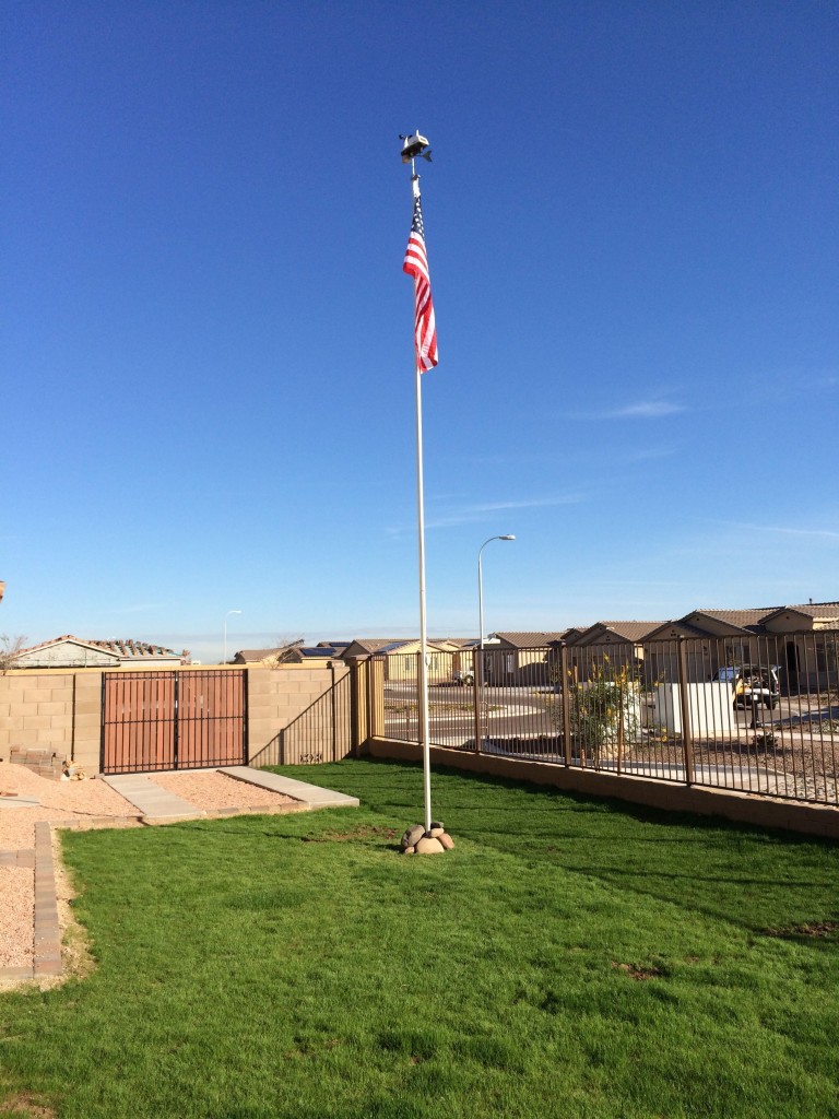 The weather station on top of the flagpole.